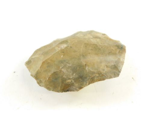 A neolithic axe head, purportedly found in North Norfolk, 10cm wide.