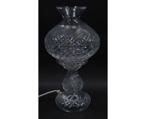 A Waterford crystal table lamp, with matching shade, 35cm high. 