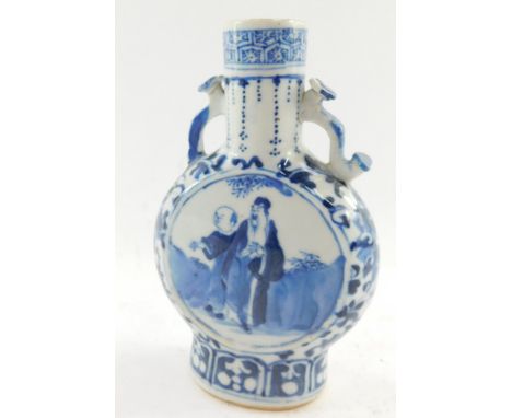 A 19thC Chinese Qing dynasty porcelain moon flask, with moulded handles and painted panels set with figures in flowing robes,