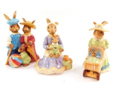 Three Royal Doulton Bunnykins figure groups, boxed, comprising Sunday Stroll, Quiet Time, and Baby's First Outing. 