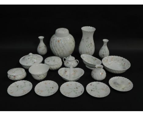 A group of Wedgwood porcelain decorated in the Campion pattern, including a ginger jar and cover, vases, dressing table pots 