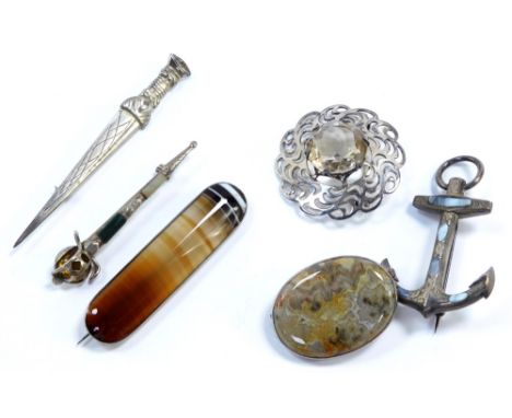 Six Scottish brooches, comprising a silver and Scottish agate oblong brooch, c1900., Scottish silver and smokey quartz Celtic