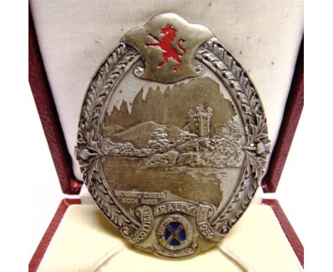 THE ROYAL SCOTTISH AUTOMOBILE CLUB A Scottish Rally 1934 metal and enamel dashboard badge 'Urquhart Castle Loch Ness' by Alex