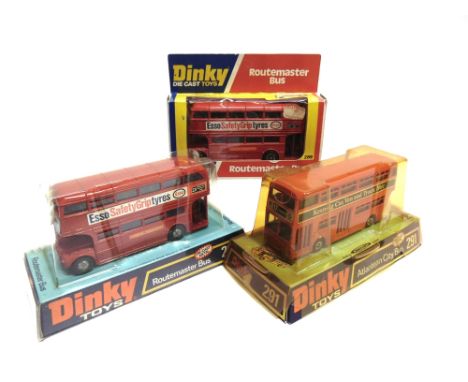 THREE DINKY MODEL BUSES  comprising a No.289, Routemaster Bus, red with 'Esso Safety Grip Tyres' advertisements, cast metal h