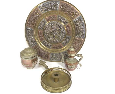 An Eastern brass copper and white metal mounted circular panel, an Eastern copper and white metal mounted rose water ewer and