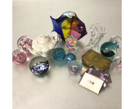 A group of ten various Caithness and other glass paperweights, a Murano style fish, a horn pistol flower vase, a reproduction
