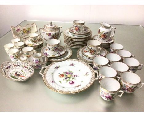 A Dresden Continental porcelain part tea service, including twelve side plates, twelve saucers, twelve cups, two handled suga