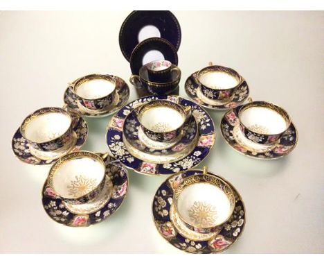 A 19thc English china fifteen piece part tea service with handpainted floral decoration, with blue and gilt reserves and a Li