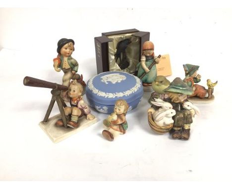 A collection of Hummel and Hummel style pottery figures including Star Gazer, Girl Sweeping, Winged Angel, Wedgwood jasparwar