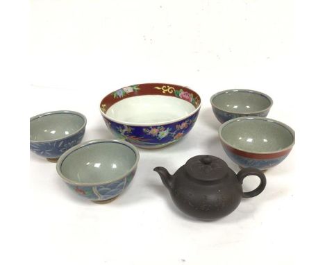 A set of four Japanese rice bowls decorated with stylised pomegranate design, a Japanese pottery teapot, a Chinese modern bow