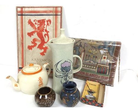 A Castle Wynd Scottish pottery coffee pot, an English Empire Exhibition of Scotland 1939 teapot with orange banded decoration