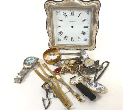 A modern silver framed Classics Nouveau England quartz clock, missing hands, a framed Silver Wedding gift, a gilt metal bangl
