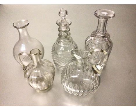 A 19thc triple ring neck decanter with hobnail cut panel, a 19thc thumb cut decanter (no stopper), an Edwardian thumb cut cla