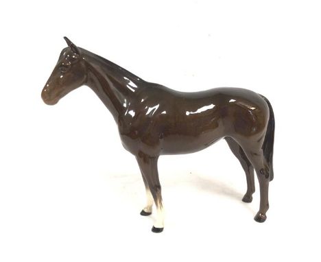 A Beswick model of a Bay Stallion (21cm x 25cm)