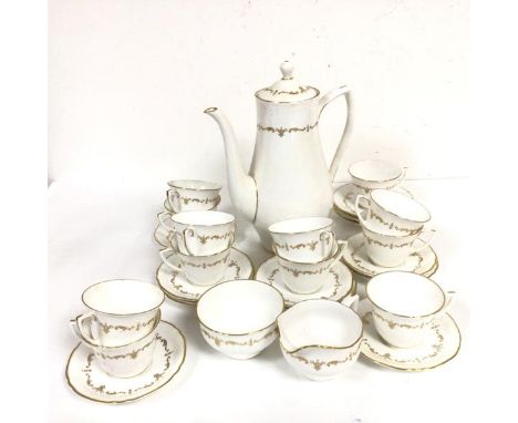 A Royal Worcester Gold Chantilly pattern coffee set, of twenty six pieces, with gilt borders (coffee pot: 26cm)