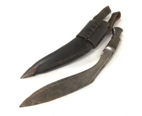 A leather scabbard with kukri, complete with belt loops (42cm)