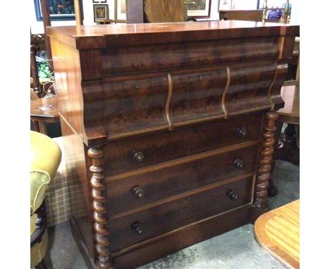 A Victorian mahogany Scottish column chest, with cushion fronted drawer above three short drawers and three long drawers, fla