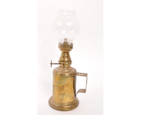 A 20th Century French brass pigeon lamp / oil lamp with inscription to front: LAMPE FEUTREE 'OLYMPE' MARQUE DEPOSEE BRULANT A