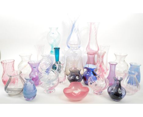 Caithness - A large 20th Century collection of Caithness glass items comprising of vases in various sizes and shapes, and bow