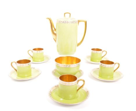 An early 20th century 1920s Czechoslovakian Karlsbad porcelain coffee service. The tea service to include a series of six cof