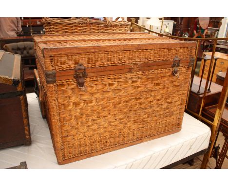 A LARGE EARLY 20TH CENTURY WICKER TRUNK, 97cm wide
