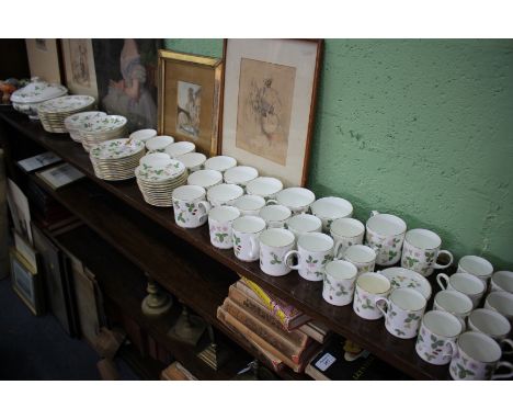 A QUANTITY OF WEDGEWOOD WILD STRAWBERRY PART DINNER SERVICE consisting of a tureen, twelve side plates, dish saucers, further