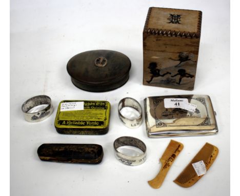 A WHITE METAL CIGARETTE CASE, three white metal napkin rings, a horn snuff box, an amber cheroot holder, two small Chinese co