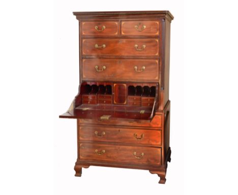 A GEORGE III MAHOGANY SECRETAIRE CHEST ON CHEST with dog tooth decoration to the cornice, the upper section with two short dr