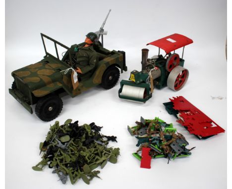 A COLLECTION OF TOYS to include a military Action Man and a western German made 'Old Smokey' steam engine