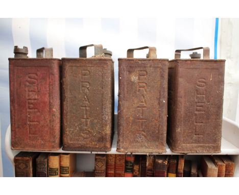 FOUR OLD OIL CANS to include Shell, Pratts and Esso, each 25cm x 28cm