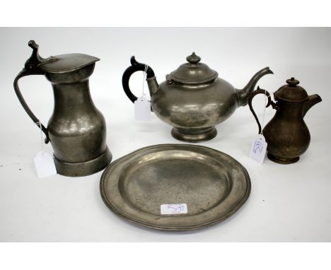 AN OLD PEWTER MEASURE or lidded jug, with touch marks beneath including J.N.M.P. beneath a crown and further touch mark to th