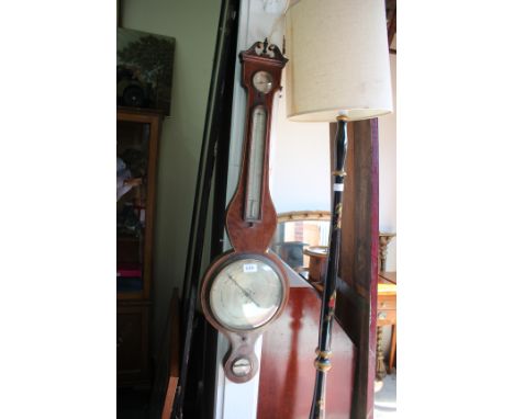 A MAHOGANY DIAL BAROMETER with swan neck pediment signed John Lion, Aylesbury 100cm high (AF)