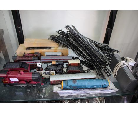A LIMA 'O' GAUGE 0-6-0 BURGUNDY COLOURED LOCOMOTIVE AND TENDER together with a quantity of various Hornby and other '00' gaug