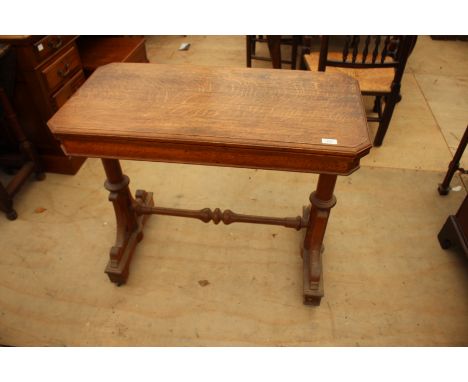 A VICTORIAN OAK FOLD OVER CARD TABLE, 95cm wide