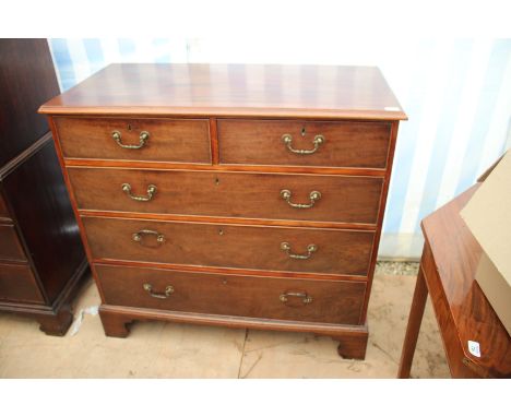 A 19TH CENTURY MAHOGANY CHEST of two short and three long drawers standing on bracket feet, 110cm wide x 104cm high