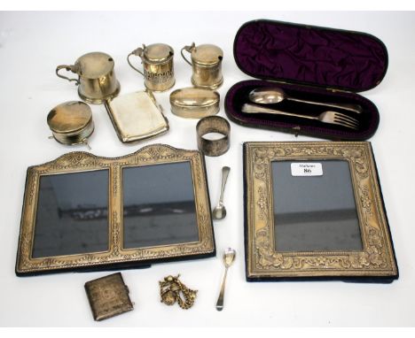 TWO SILVER MOUNTED PHOTOGRAPH FRAMES together with further silver items to include mustard pots a trinket box etc. 