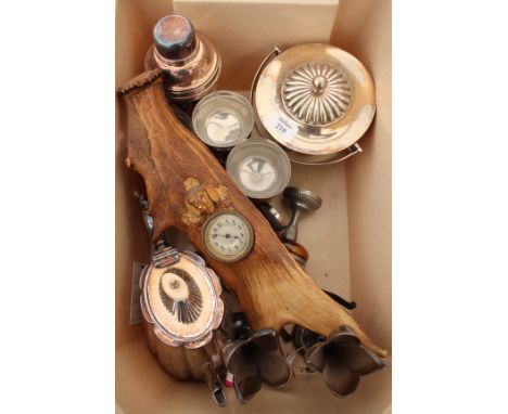 A SILVER PLATED ICE BUCKET AND COVER together with a cocktail shaker, decorative timepiece mounted in an antler, a silver pla