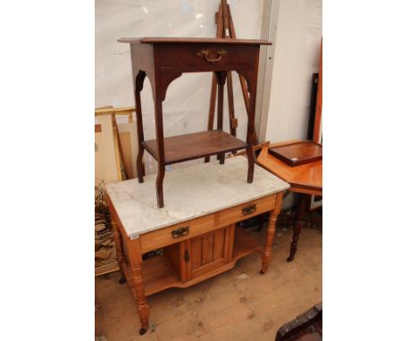 A VICTORIAN MARBLE TOPPPED PINE WASH STAND with two frieze drawers and single cupboard door below standing on turned tapering