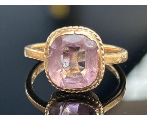 Yellow metal ring possibly 18ct set with good quality amethyst Size K.5 2.5g 
