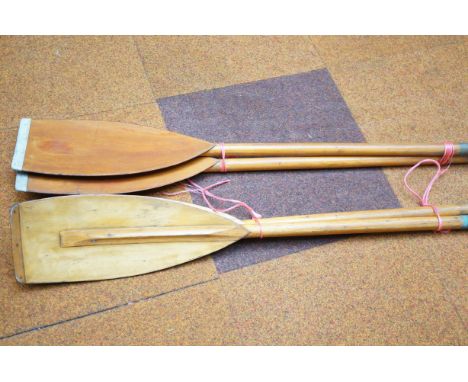 Two pairs of vintage canoe paddles