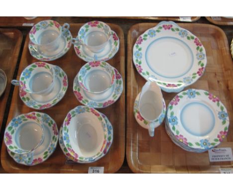 Two trays of Royal Albert bone china floral teaware items comprising teacups and saucers; milk jug; sugar bowl and various pl