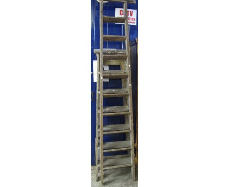 Vintage folding ladder together with another larger wooden ladder. (2)