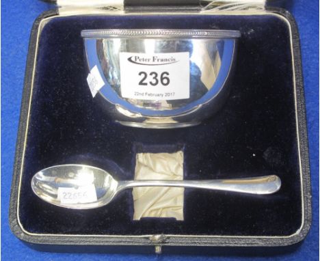 Cased silver two piece bowl and spoon set, Sheffield hallmarks.   CONDITION REPORT:  Missing napkin ring. Sheffield 1934 hall