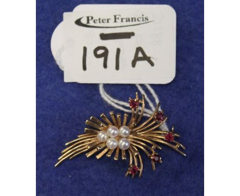 9ct pearl and garnet floral design brooch.