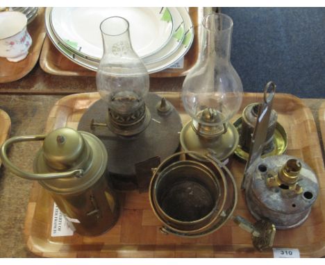 Tray of assorted metalware to include: brass and other single oil burners; brass wall bracket etc.