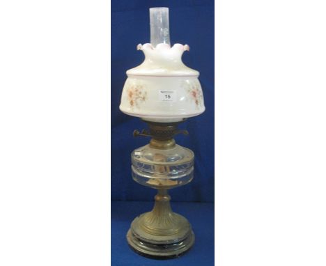 Early 20th Century brass double burner oil lamp with glass reservoir on brass pedestal with ceramic base, printed opaque glas