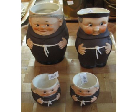 Two similar Hummel jugs in the form of monks, together with a pair of monk Hummel egg cups. (4)