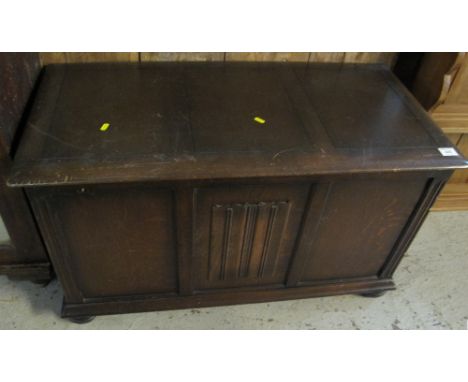Reproduction oak three panelled trunk or coffer.