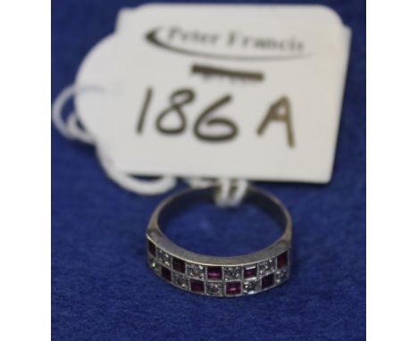 Ruby and diamond chip square design ring.