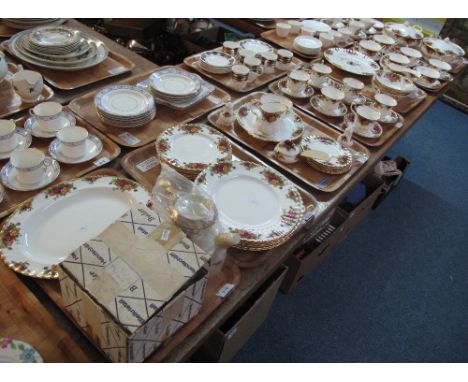 Seven trays of Royal Albert bone china 'Old Country Roses' items comprising: teacups and saucers; milk jug; sucrier; various 